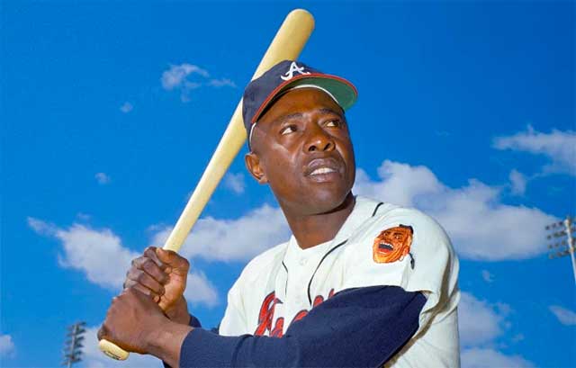 Milwaukee Braves Hank Aaron Leaning on Bat During Baseball Game